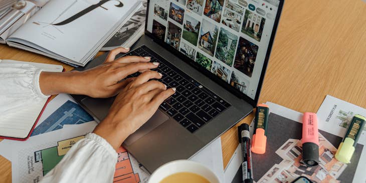 Product developer working on a new project while enjoying a cup of coffee.