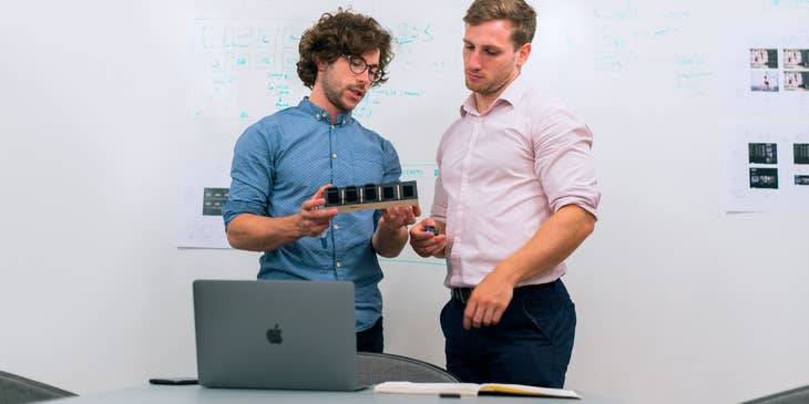 Technical Marketing Engineer discusses product with the marketing team to develop a campaign strategy