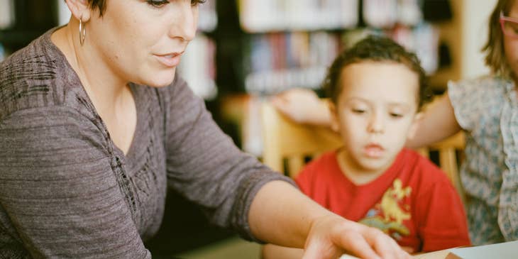 ABA Specialist is educating the child in a special activity.