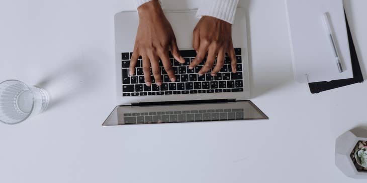 Data Entry Operator working on a laptop