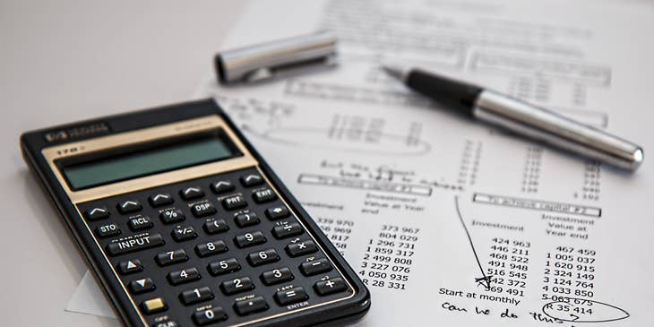 A calculator and finance sheet to help a forensic accountant to conduct an audit.