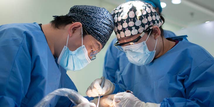 surgical technologist performing an operation