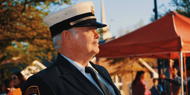 Chief of Police looks on the ongoing ceremony