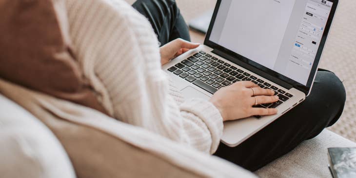 A copywriter creating content on a laptop.