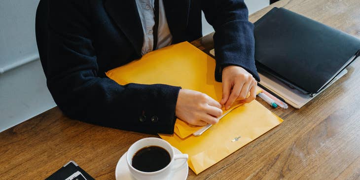 A Court Clerk preparing confidential court orders to be distributed to the court attorneys.