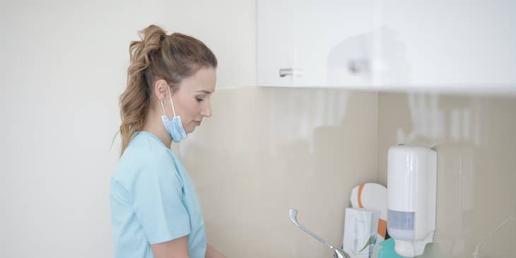 Dialysis Technician doing handwashing after attending to patient needs.