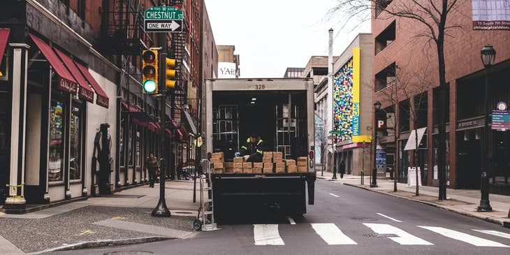 A DZ Driver checking and securing goods before taking off to prevent packages from damages.