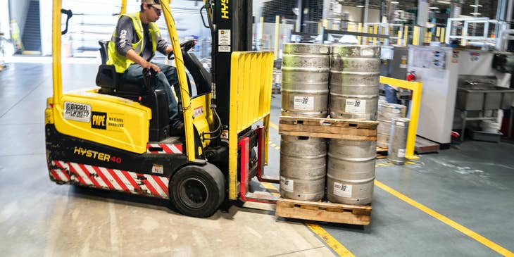 A Forklift Operator about to transport materials to a different location within the warehouse.