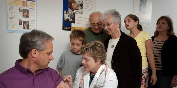 Geneticist seeing a family of patients.