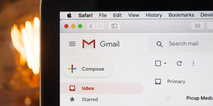 An email inbox on a laptop.