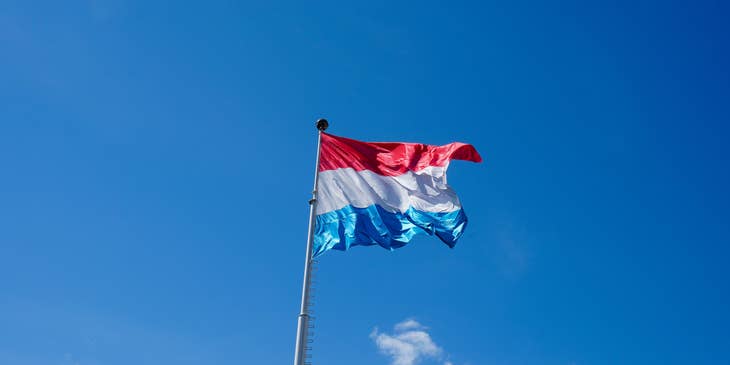 Flag of Luxembourg blowing in the wind.