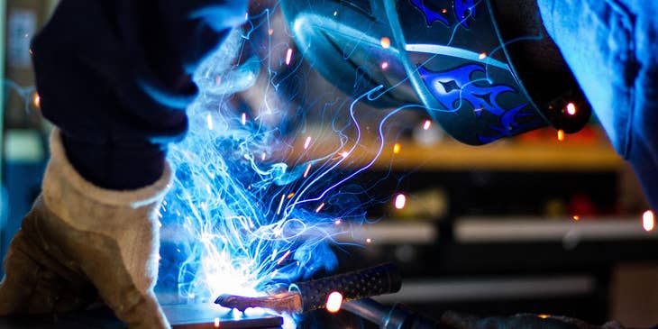 MIG welder welding a steel frame