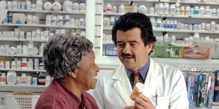 Pharmaceutical sales representative informs a client on the proper dosage and side effect of the medicine prescribed.