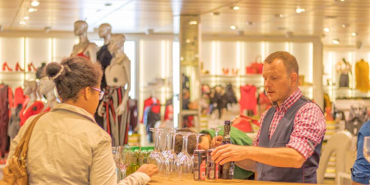 Service clerk helping a customer on what glass to buy on what occasion