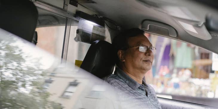 Shuttle bus driver getting ready to drive the passengers of the day