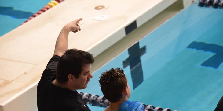 Swim Instructors teaching a young student