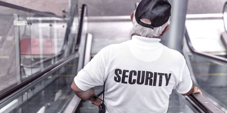 Unarmed security guard on an escalator